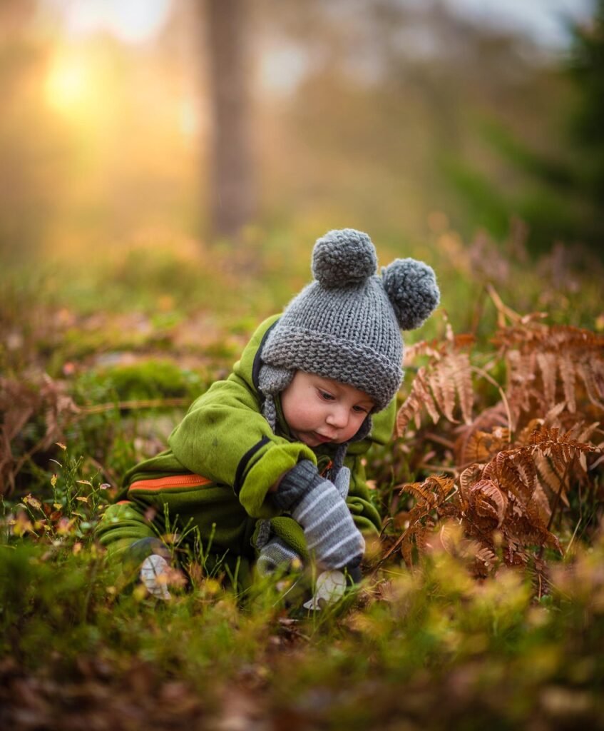 baby, bonnet, child, knitwear, knitted, winter clothes, winter clothing, toddler, outdoors, nature, baby photography, baby photoshoot, portrait, baby portrait, childhood, close-up, cute, enjoyment, fall, fun, grass, jacket, joy, kid, playing, smile, young, innocence, baby, baby, baby, baby, baby